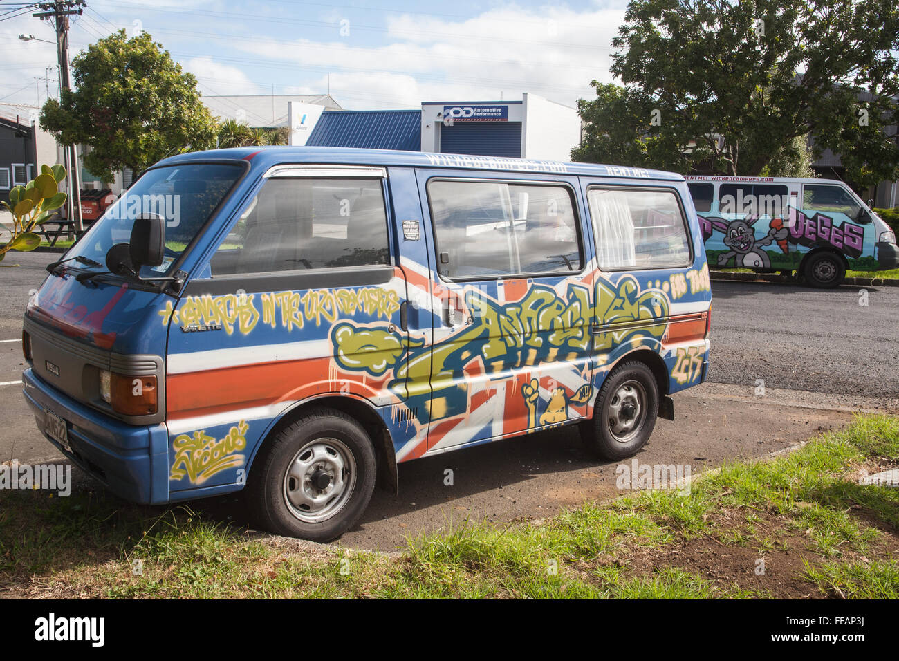 Graffiti painted grafitti graffiti van vehicle car campervan campervans of Wicked car van rental company in Auckland New Zealand Stock Photo Alamy