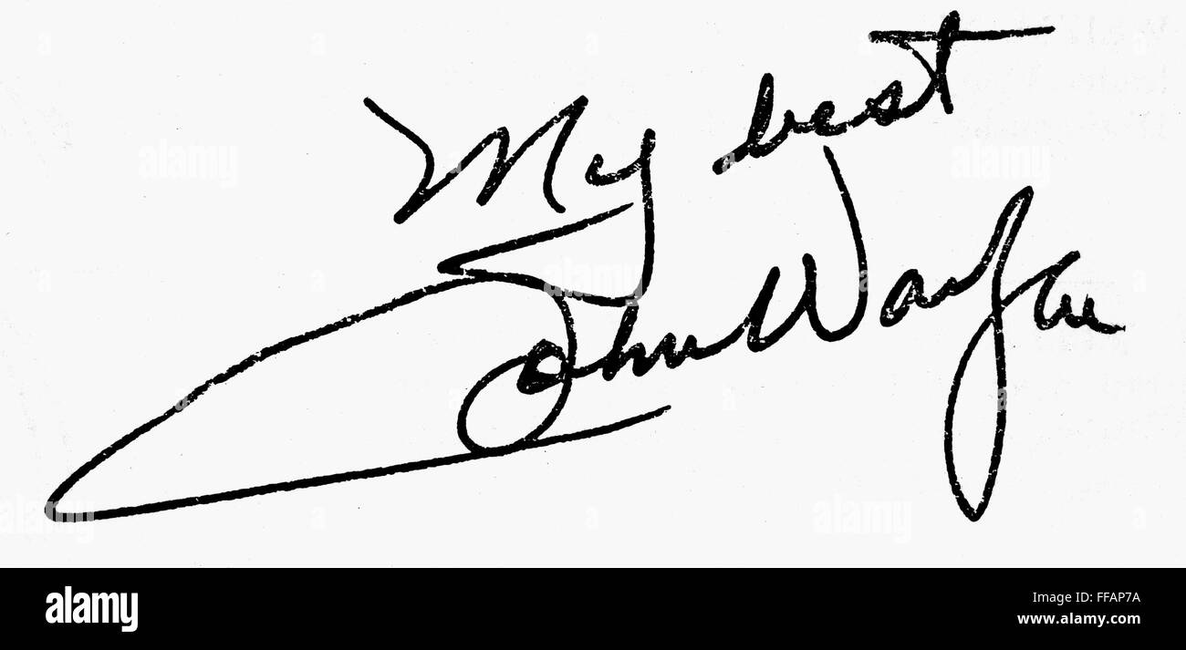 JOHN WAYNE (1907-1979). /nAmerican actor. Autograph signature. Stock Photo