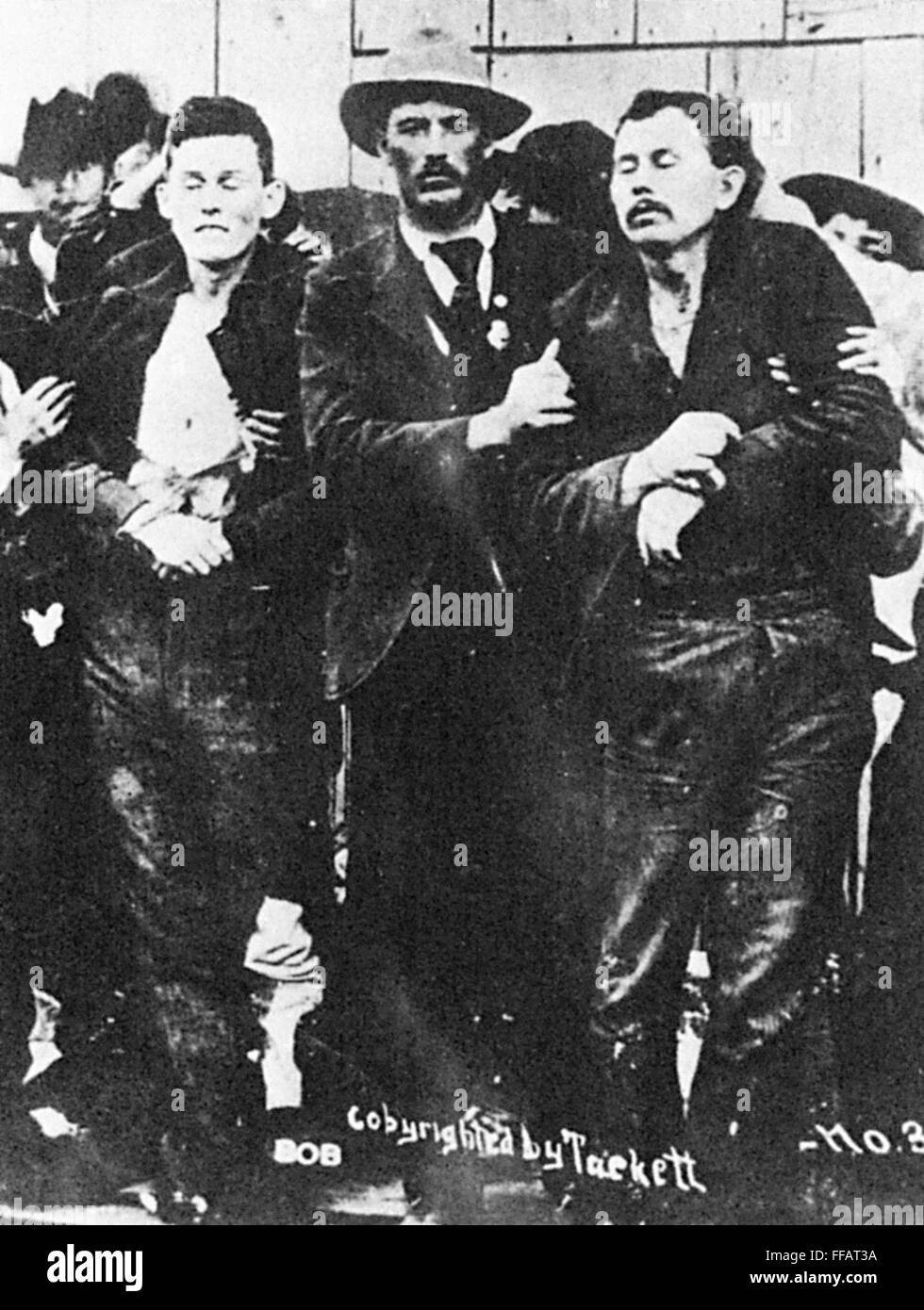 BOB & GRAT DALTON. /nBob and Grat (Gratton) Dalton minutes after their disastrous raid on two Coffeyville, Kansas banks, dead or dying, being held up by lawmen. Photographed, 5 October 1892. Stock Photo