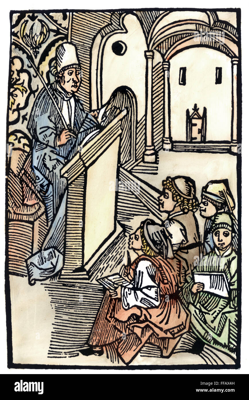EDUCATION: FRENCH SCHOOL. /nA 15th century schoolmaster, holding a switch, with his pupils. Contemporary woodcut. Stock Photo