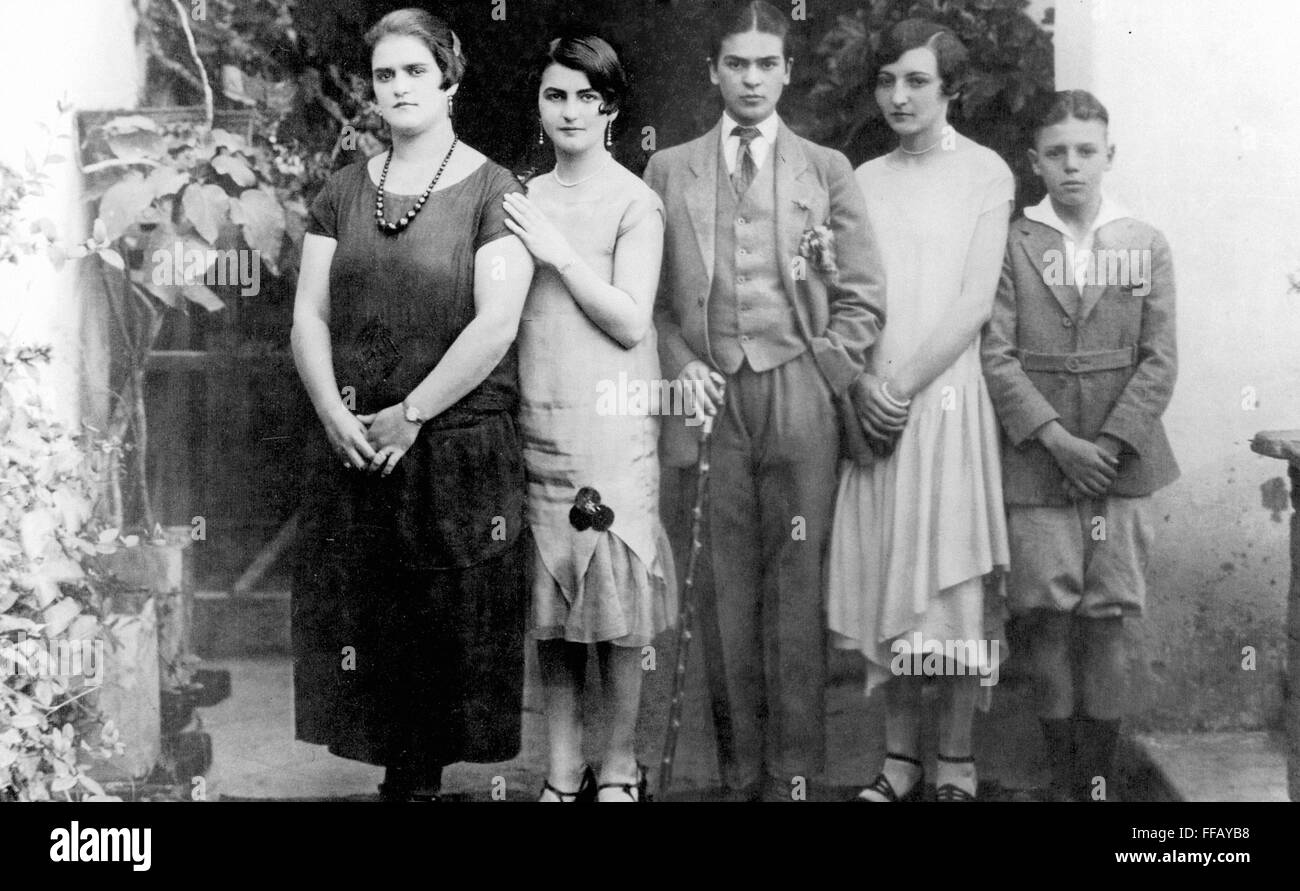 FRIDA KAHLO (1907-1954). /nMexican artist. Kahlo dressed in men's clothing (center), with her mother Matilde, sister Cristina, and other family members. Photographed by Guillermo Kahlo, Coyoacan, Mexico, 1926. Stock Photo