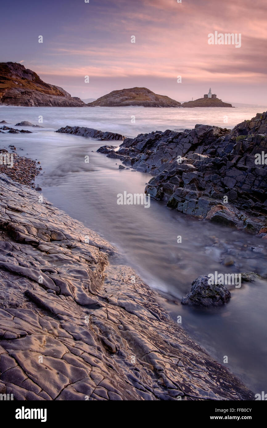 outgoing tide at mumble head,wales Stock Photo - Alamy