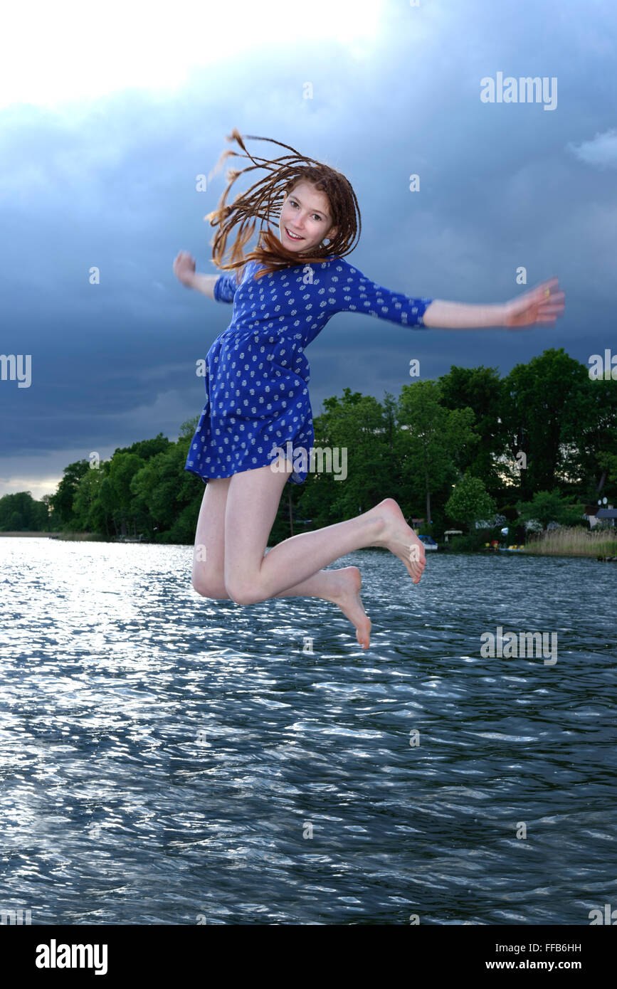 Young girl jumping water hires stock photography and images Alamy