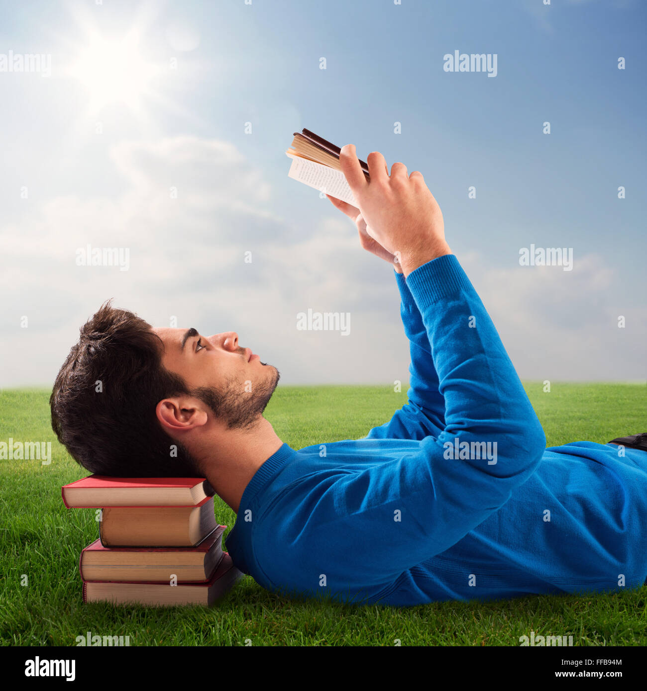 Relax with book Stock Photo - Alamy