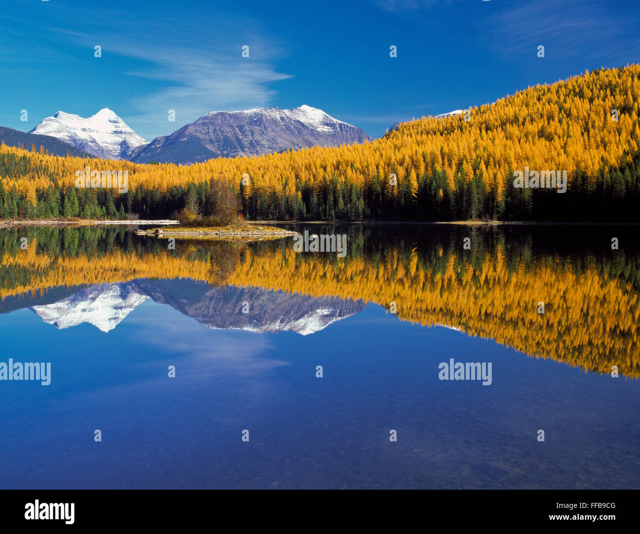 distant peaks of glacier national park in autumn above stanton lake in the great bear wilderness near west glacier, montana Stock Photo