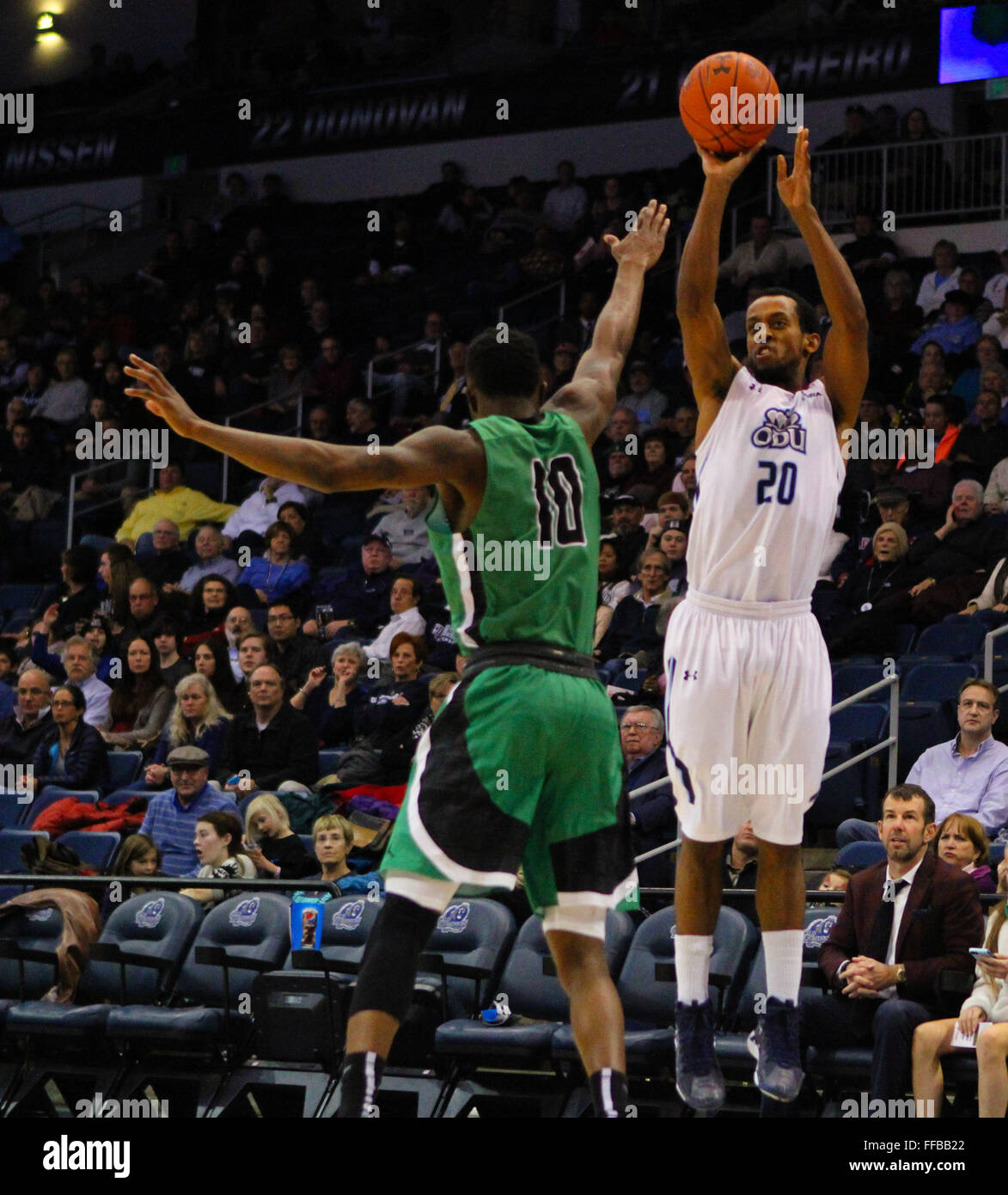 Norfolk, VA, USA. 11th Feb, 2016. Old Dominion Monarchs guard Trey Freeman (20) with the jump shot over North Texas Mean Green guard Deckie Johnson (10) during the North Texas Mean Green vs Old Dominion Monarchs game at the Ted Constant Center in Norfolk, VA. Old Dominion beat North Texas 67-47. Jen Hadsell/CSM/Alamy Live News Stock Photo