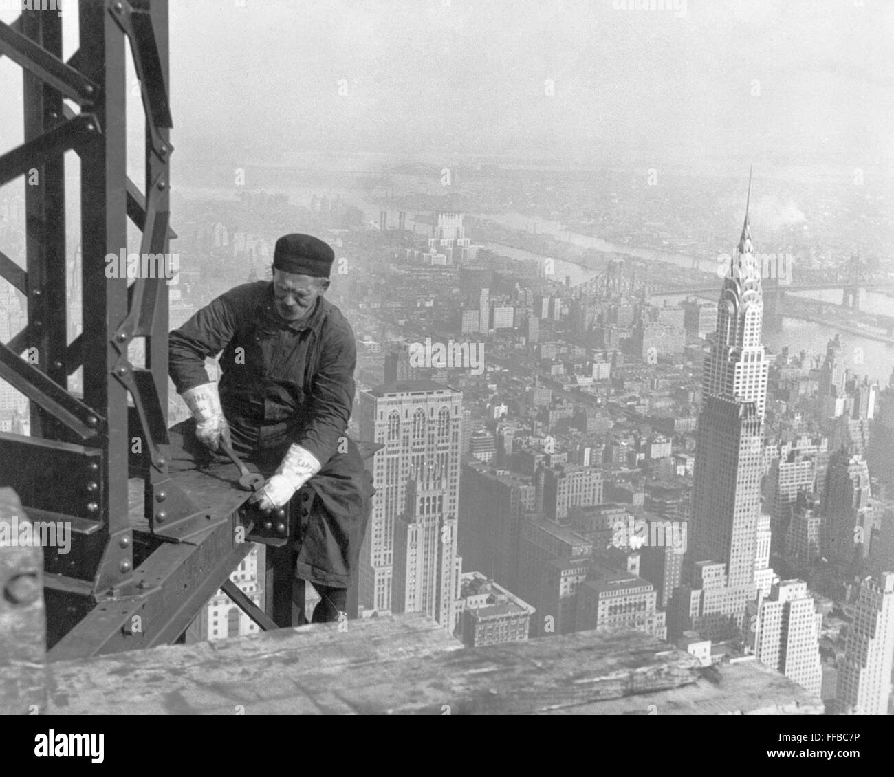 Old-timer, keeping up with the young boys. Many structural workers are above middle-age working on the Empire State Building. Circa 1930. Photograph by By Lewis Hine.      This archival print is available in the following sizes:    8' x 10'   $15.95 w/ FREE SHIPPING  11' x 14' $23.95 w/ FREE SHIPPING  16' x 20' $59.95 w/ FREE SHIPPING  20' x 24' $99.95 w/ FREE SHIPPING    * The American Photoarchive watermark will not appear on your print. Stock Photo