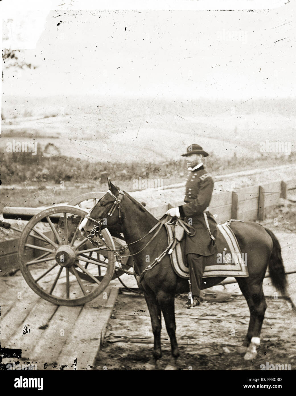 Gen. William T. Sherman on horseback at Federal Fort No. 7-Atlanta, Ga. Photograph of the War in the West. These photographs are of Sherman in Atlanta, September-November, 1864. After three and a half months of incessant maneuvering and much hard fighting, Sherman forced Hood to abandon the munitions center of the Confederacy. Sherman remained there, resting his war-worn men and accumulating supplies, for nearly two and a half months. During the occupation, George N. Barnard, official photographer of the Chief Engineer's Office, made the best documentary record of the war in the West. Stock Photo