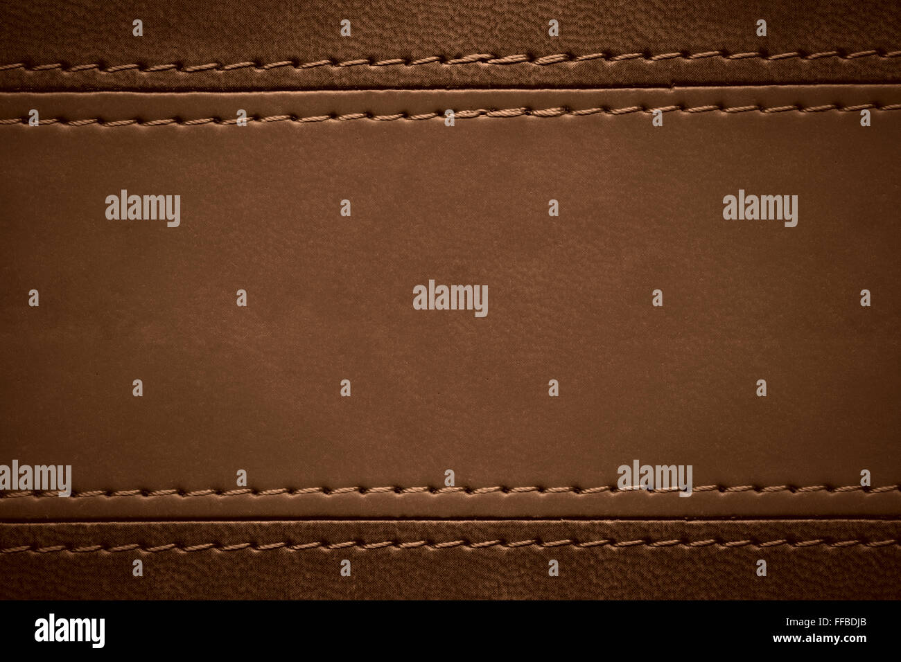 brown leather texture with seam at margins or vintage background