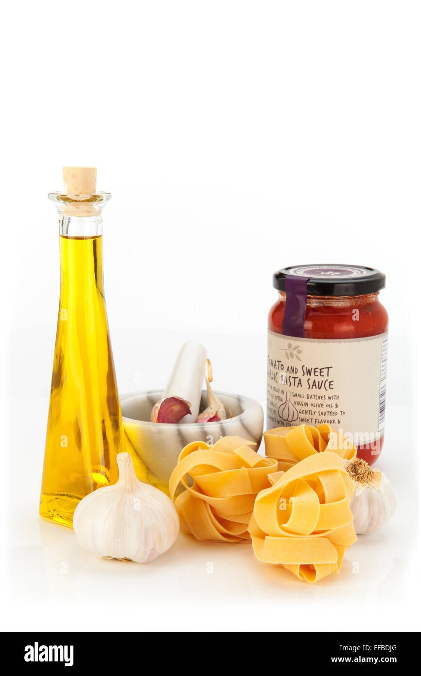 Pestle & Mortar with Pasta, Sauce, Garlic and olive oil Stock Photo Alamy