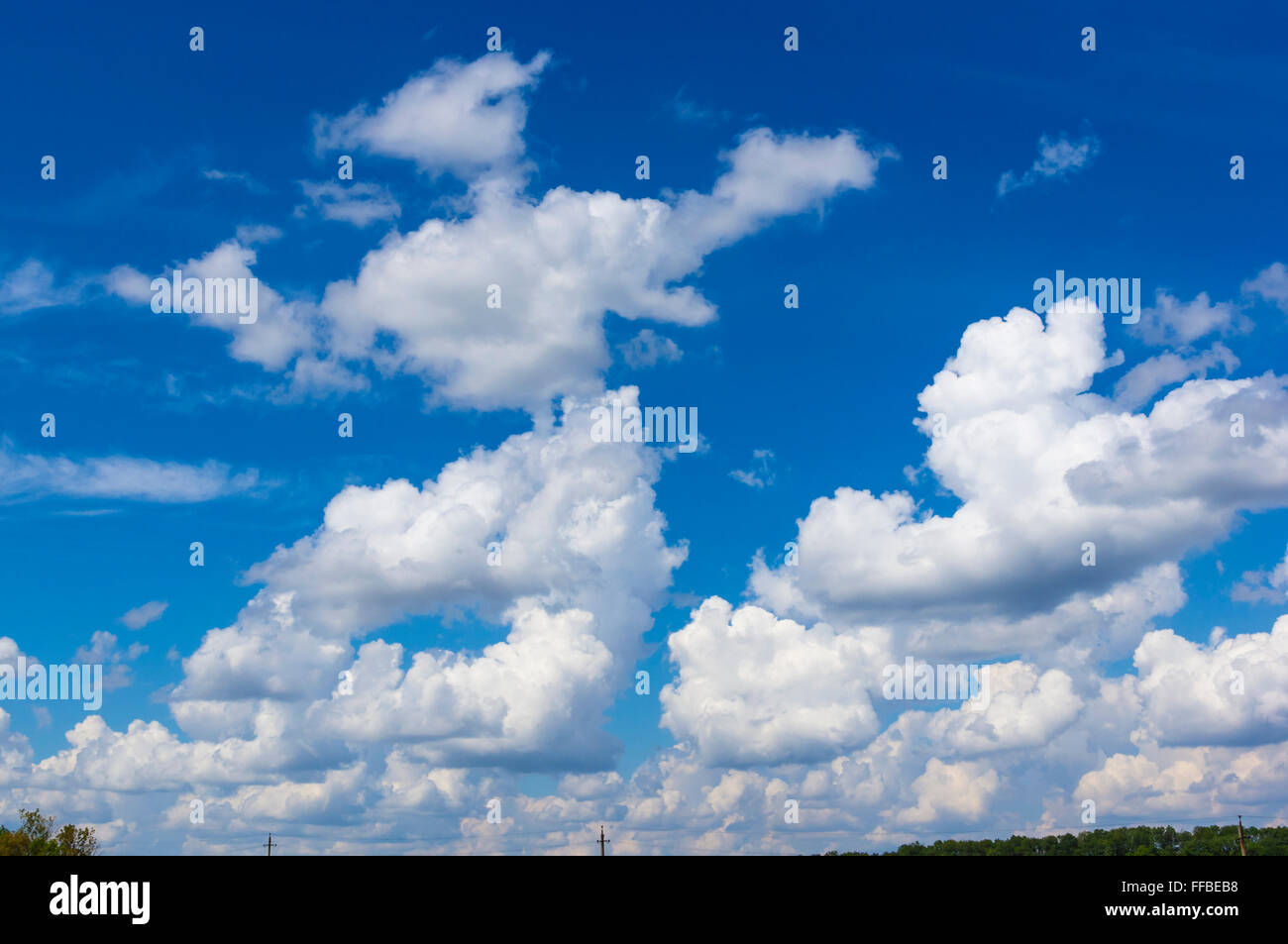 White clouds in the blue summer sky Stock Photo - Alamy