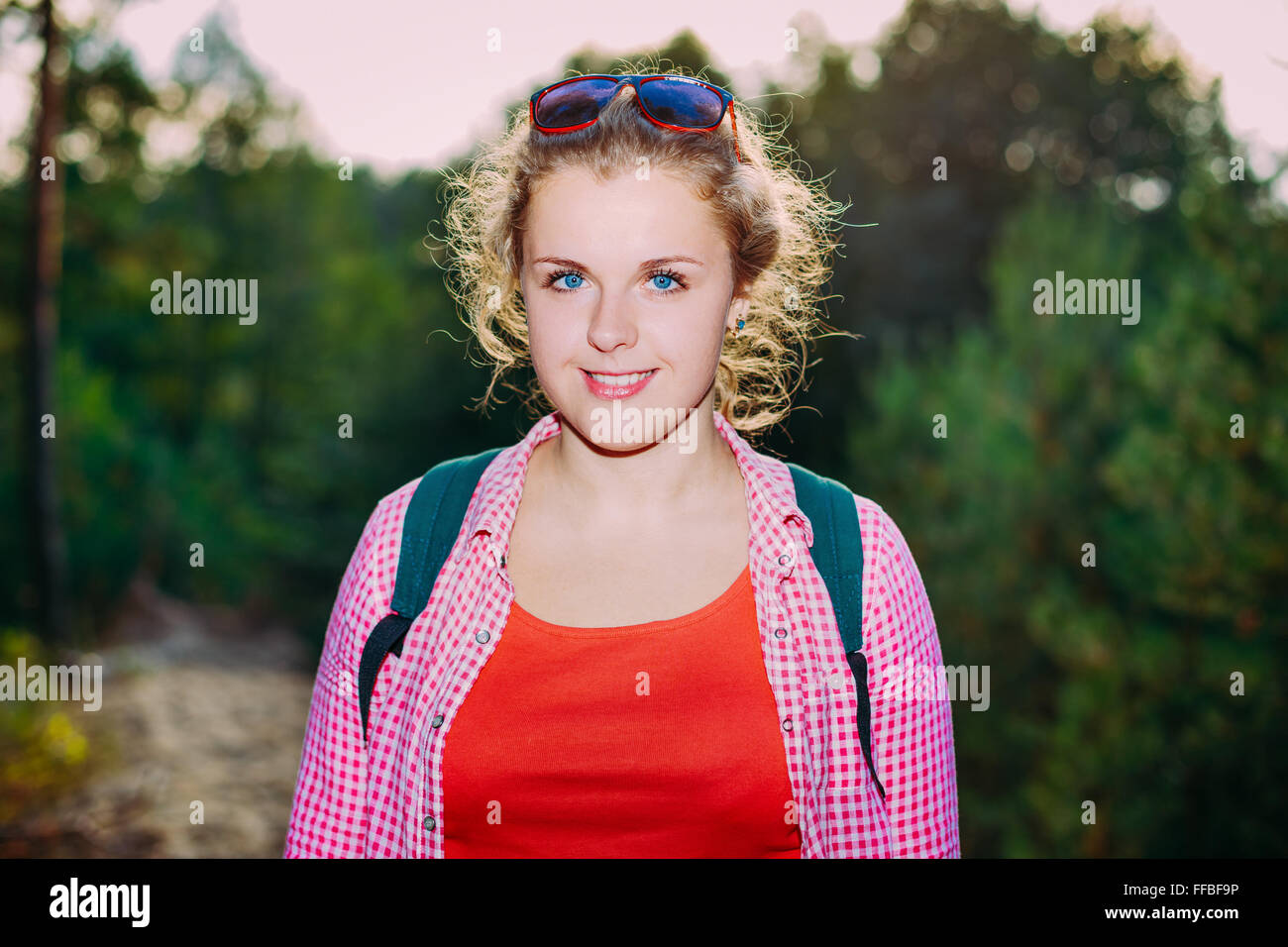 Close Up Beautiful Plus Size Young Smiling Woman In Shirt Posing In Summer Forest At Woods Background Stock Photo