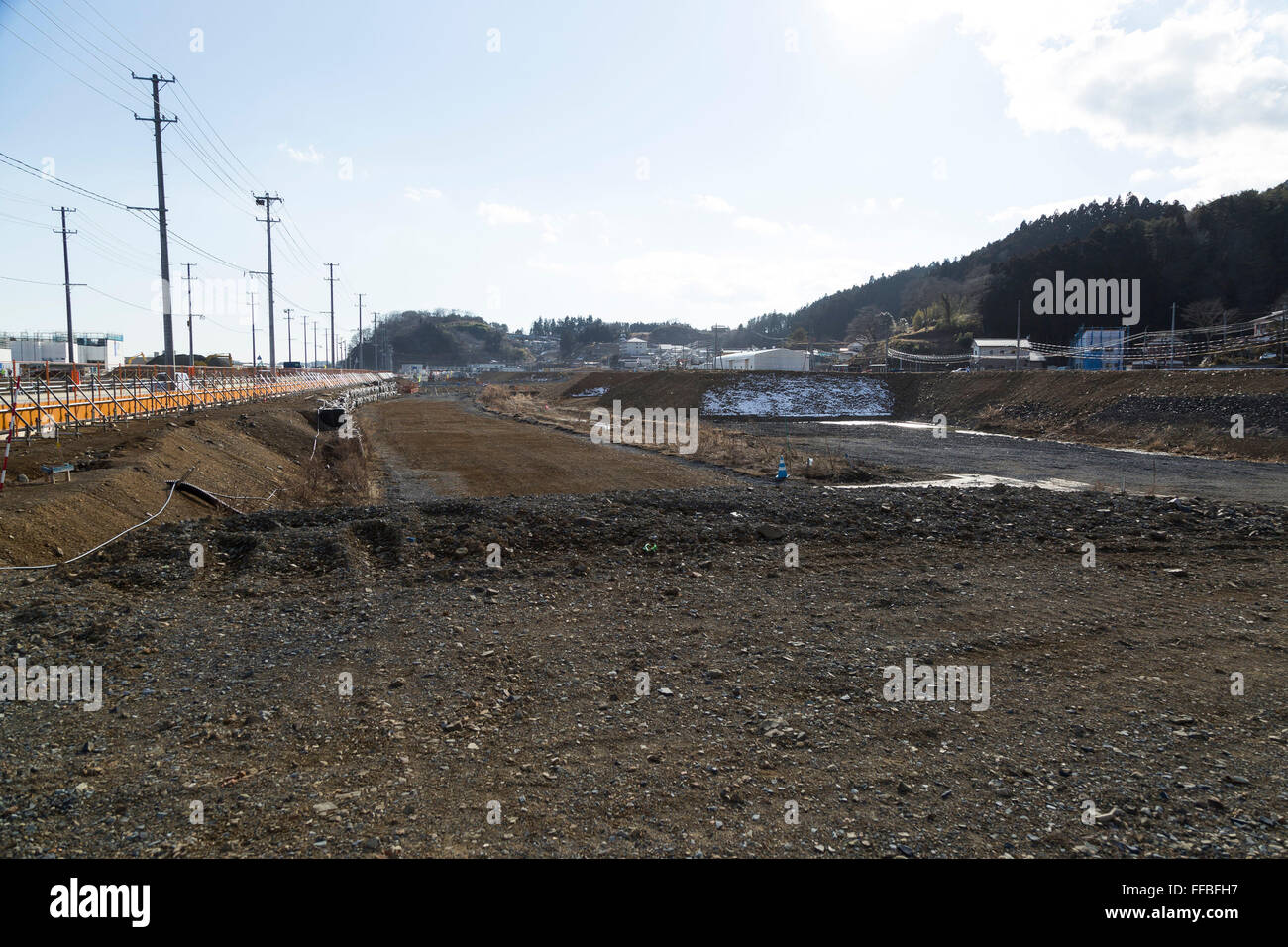 Low lying land in Kesennuma on February 8, 2016, Miyagi Prefecture, Japan. This area used to be occupied by homes and businesses but that changed when the 2011 Tohoku Earthquake and Tsunami struck. As part of the clean up process the 330-ton fishing vessel Kyotoku Maru No. 18 that was swept half a kilometre inland to here was dismantled and removed. © Rodrigo Reyes Marin/AFLO/Alamy Live News Stock Photo