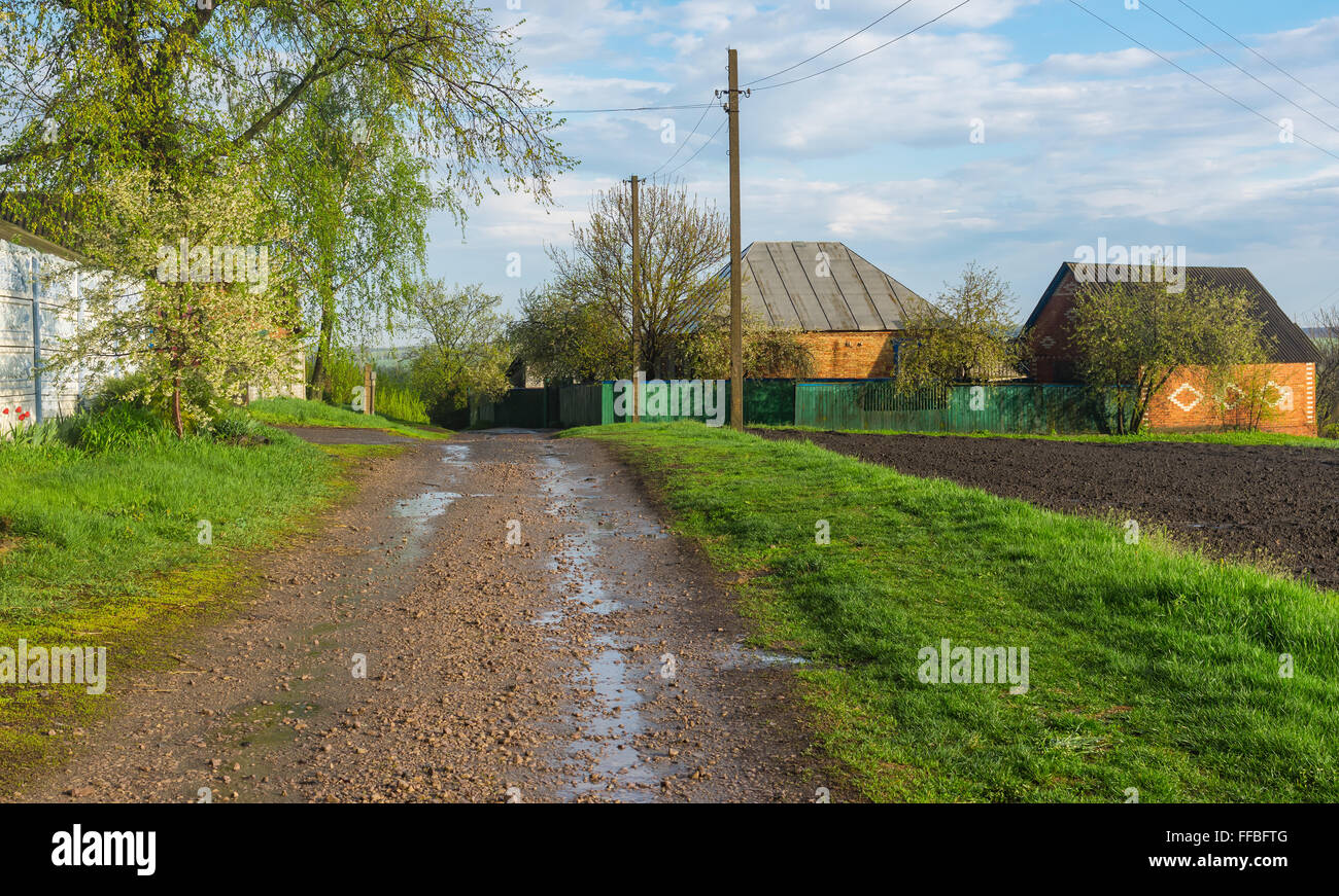 Spring landscape with macadam road in Boromlya village in Sumskaya