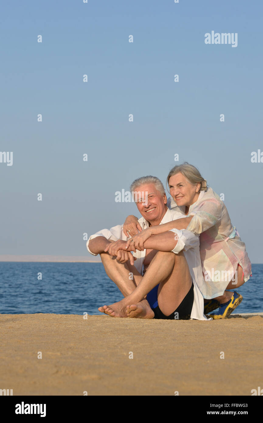 Mature couple on beach Stock Photo - Alamy