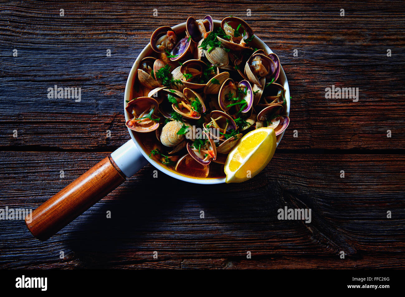 Clams tapa in ceramic pan tapas from Spain seafood Stock Photo - Alamy