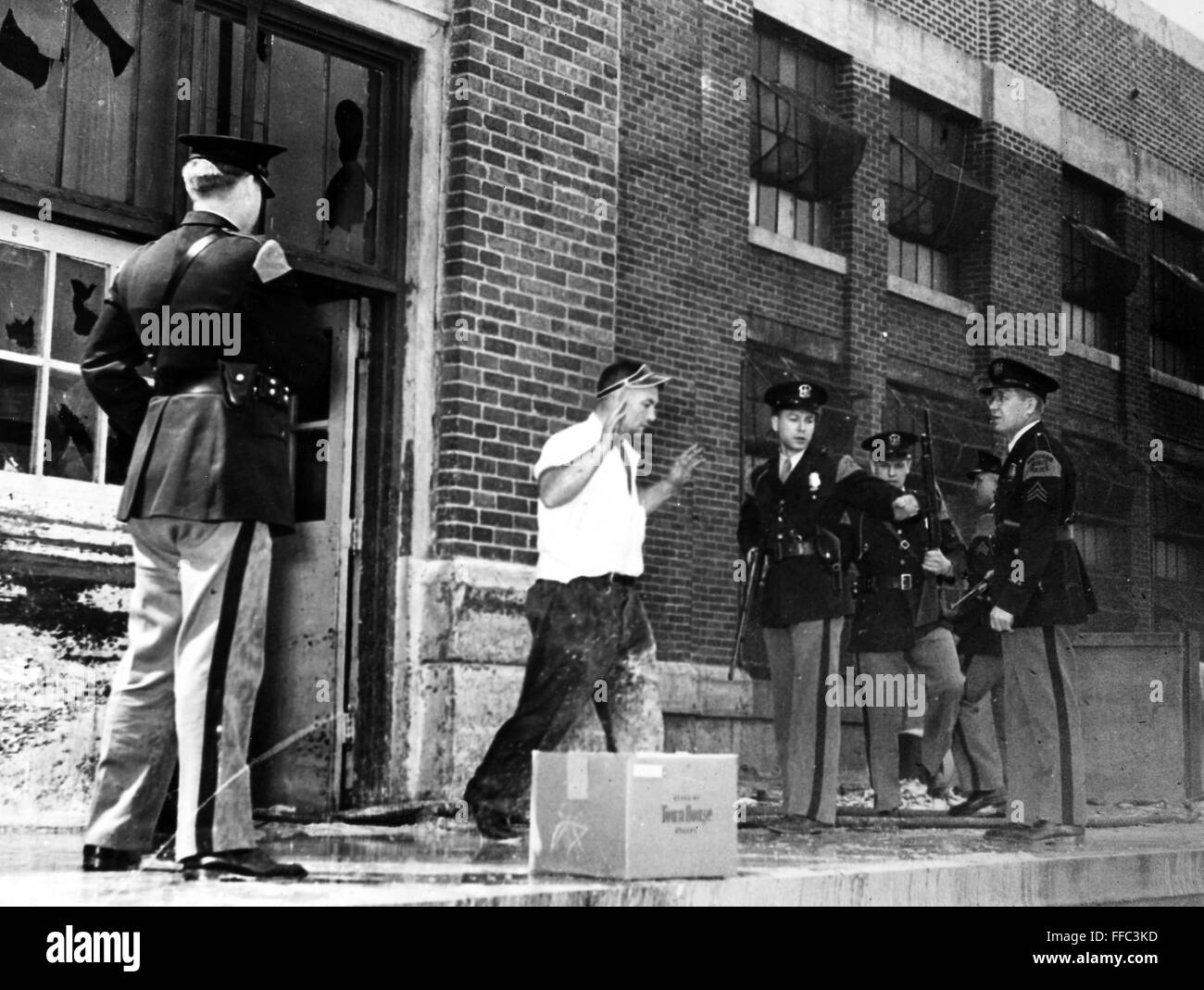JACKSON PRISON RIOT, 1952. /nA convict surrenders to state police