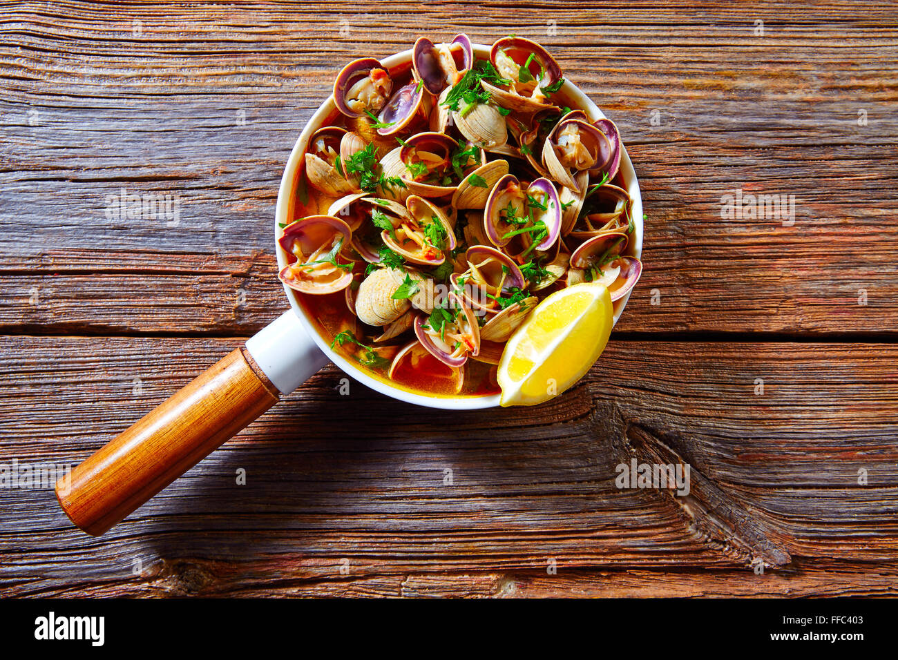 Clams tapa in ceramic pan tapas from Spain seafood Stock Photo Alamy
