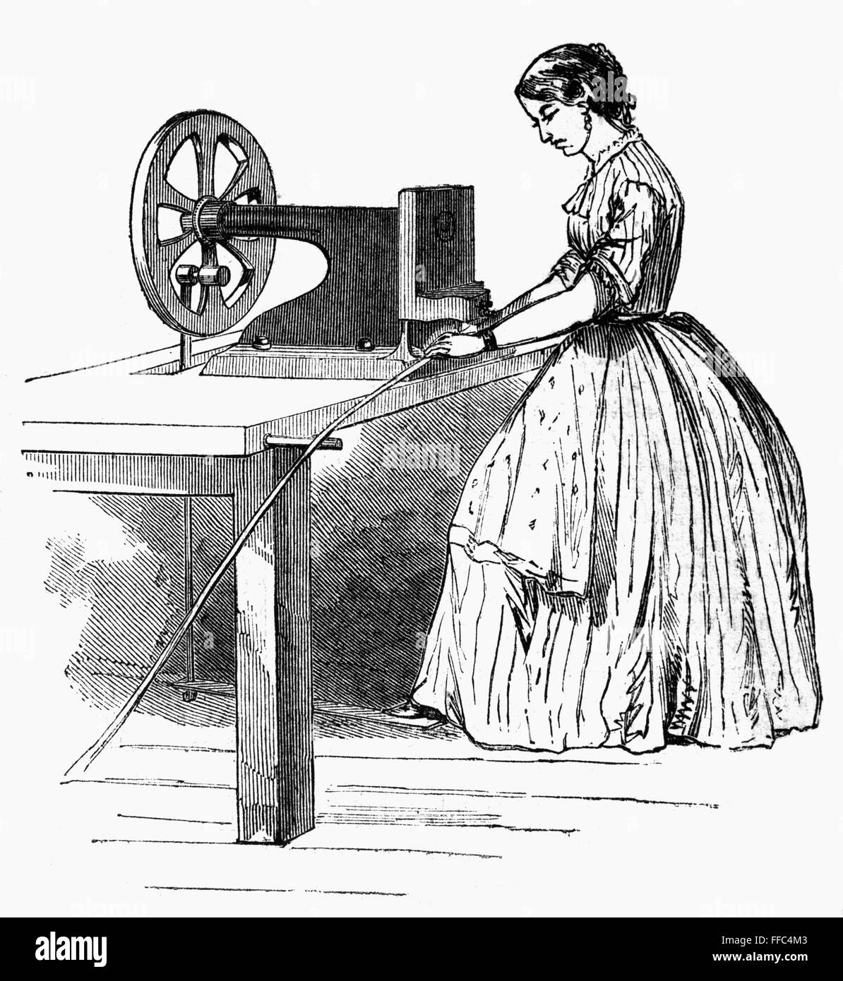 CLASP-CUTTING MACHINE. /nClasp-cutting machine at Thomson's Skirt Factory, New York. Wood engraving, 1859. Stock Photo