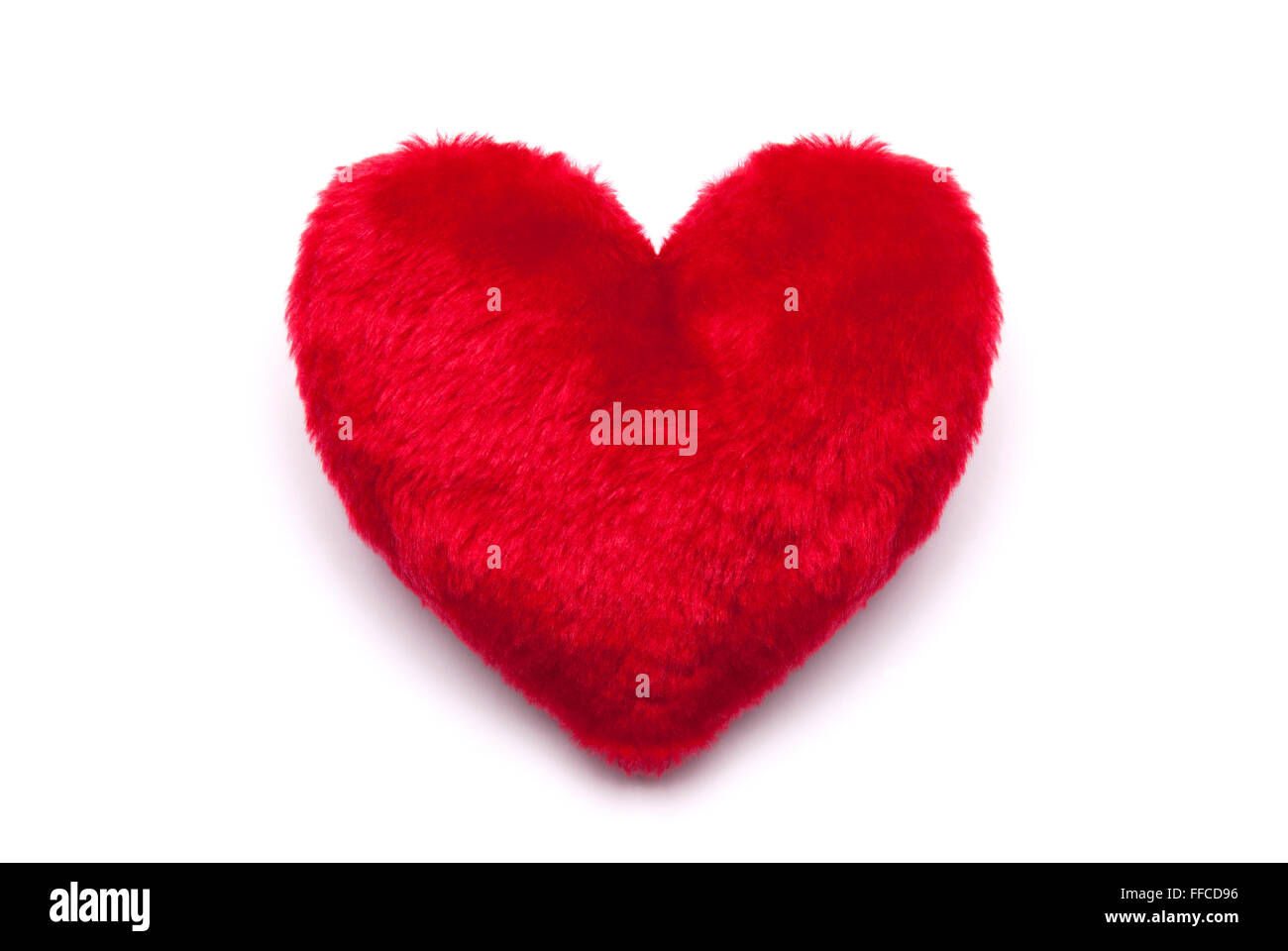 Plush red heart on white background Stock Photo