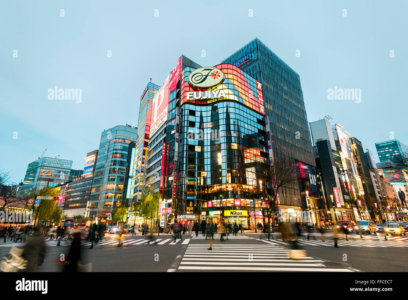 Tokyo, Japan - January 21, 2016: Shoppers near Fujiyama Building in the Ginza District in the Chūō area of Tokyo. Stock Photo