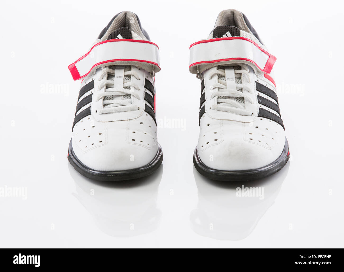 Adidas Olympic weightlifting shoes on a white background with a reflection  Stock Photo - Alamy