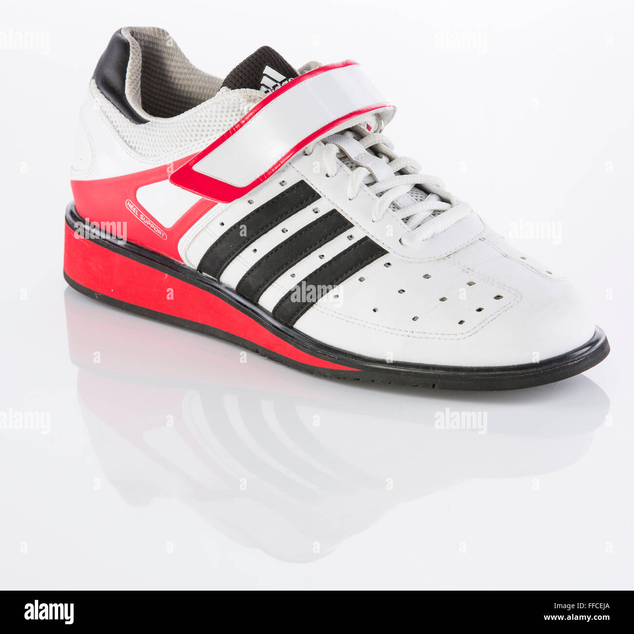 Adidas Olympic weightlifting shoes on a white background with a reflection  Stock Photo - Alamy