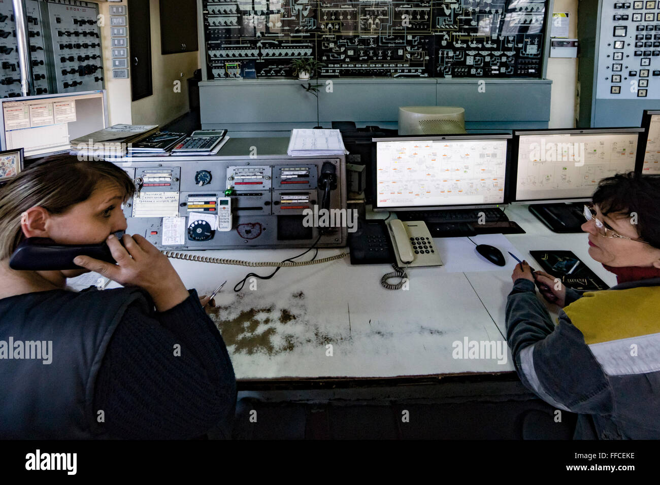 Workers are seen in a control room of a DTEK operated coal processing plant in Donbas, Ukraine. Stock Photo