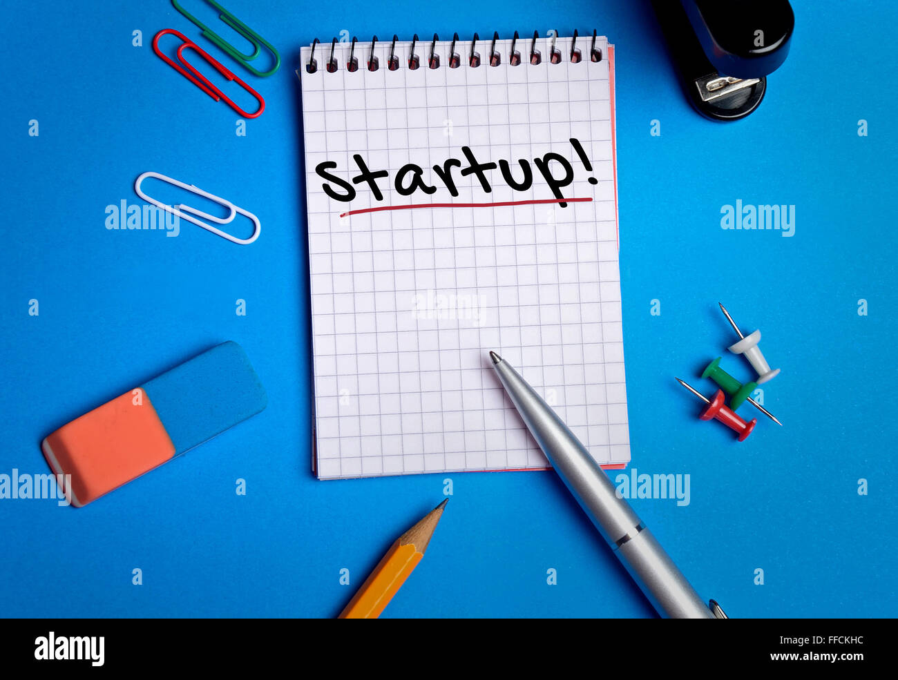 Start up word on notebook page Stock Photo