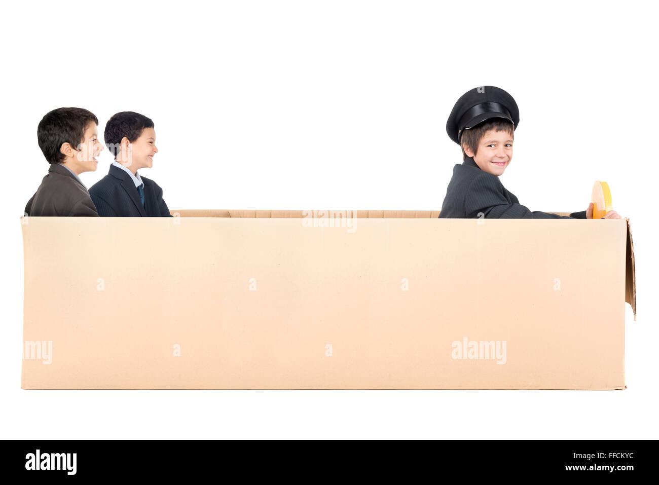 Young businessmen in cardboard box limousine with driver Stock Photo