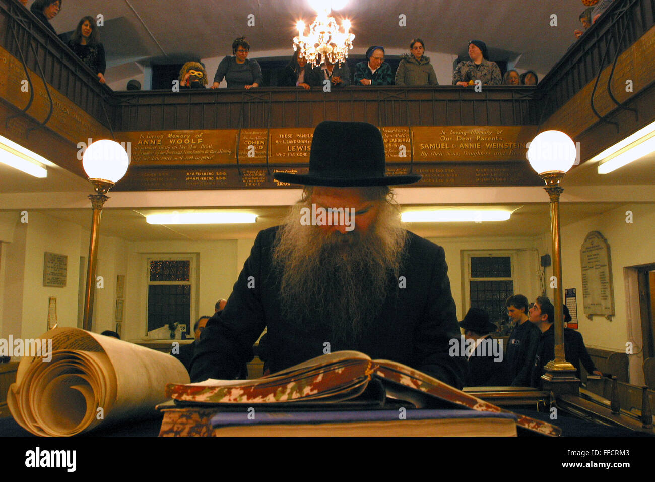 Rabbi Herschel Gluck of Walford road Synagogue reads the Megillah "The