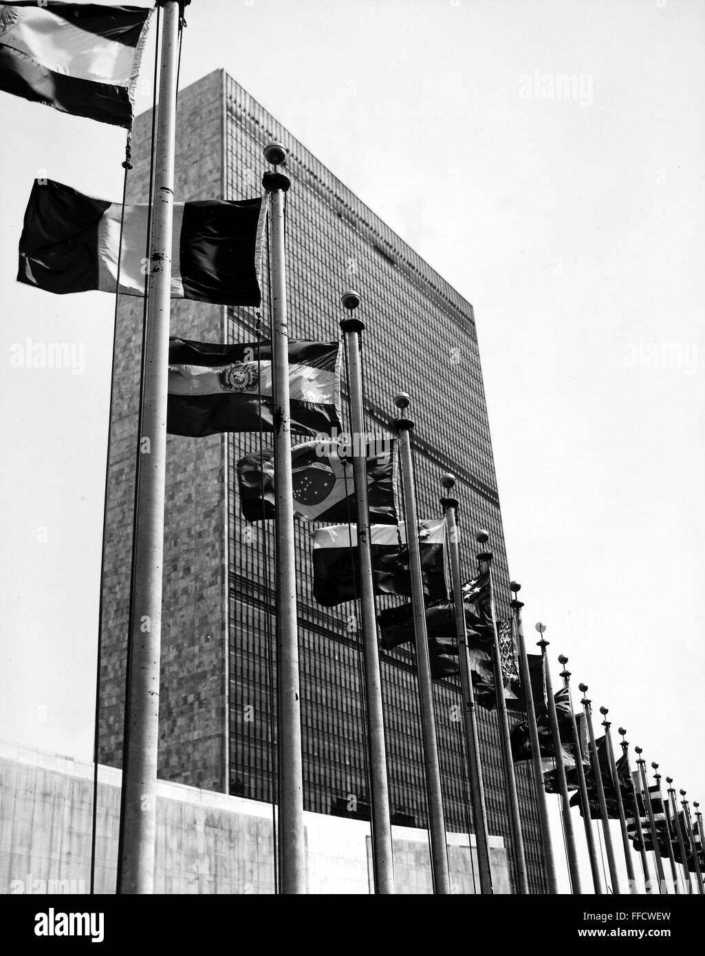 UNITED NATIONS, 1959. /nView of some of the flags of member nations at ...