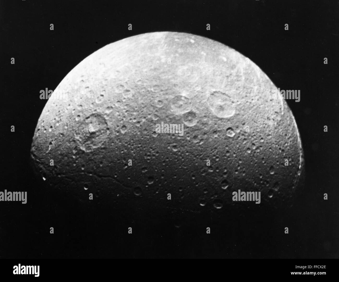 moon-of-jupiter-dione-nphotographed-by-voyager-i-1980-stock-photo