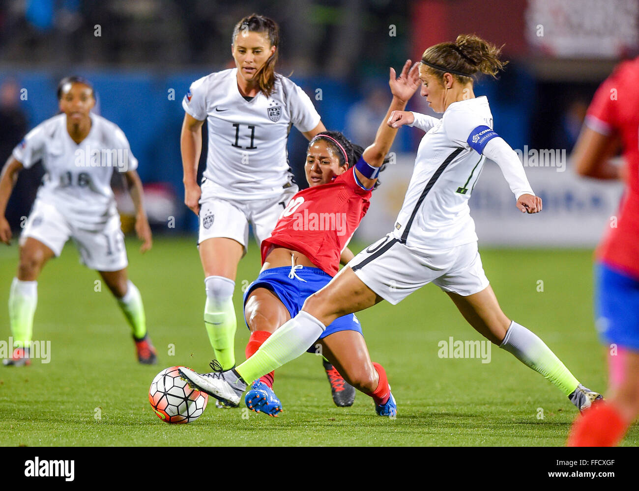 USA Midfielder Carli Lloyd (10) battles for the ball as USA Defender