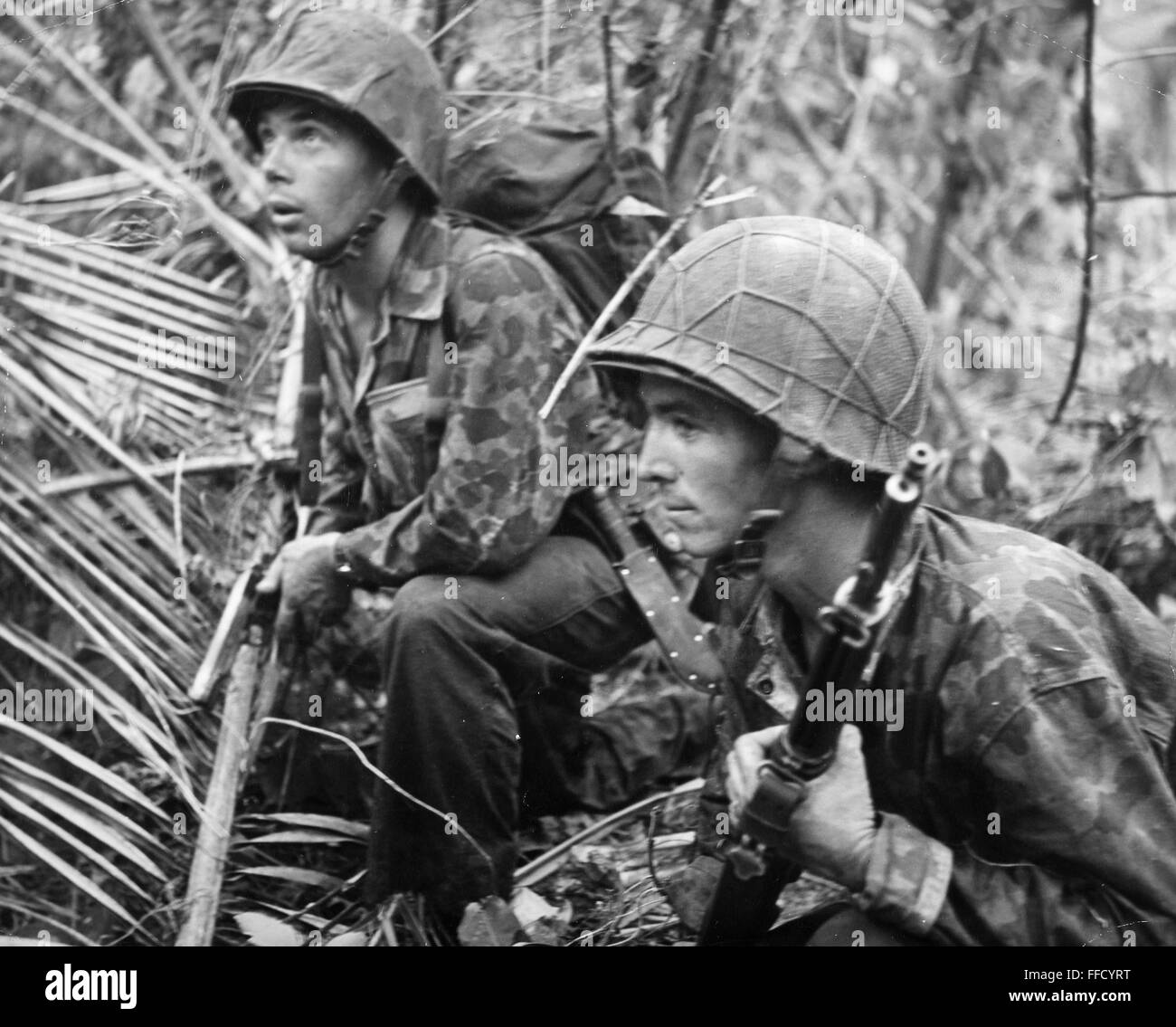 WORLD WAR II: BOUGAINVILLE. /nTwo U.S. Marines on patrol at Cape Torokina, Bougainville Island, New Guinea. Photographed late 1943. Stock Photo