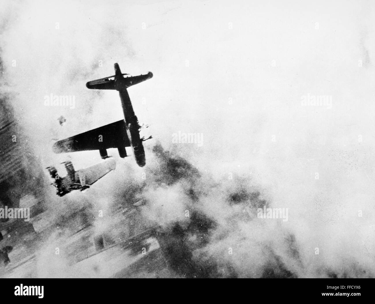 WORLD WAR II: B-17, 1945. /nA B-17 Flying Fortress of the U.S. 8th Air Force hit by cannon fire from German fighter planes while on a bombing mission over an ordnance depot at Oranienburg, Germany, 18 miles north of Berlin. Photographed April 1945. Stock Photo