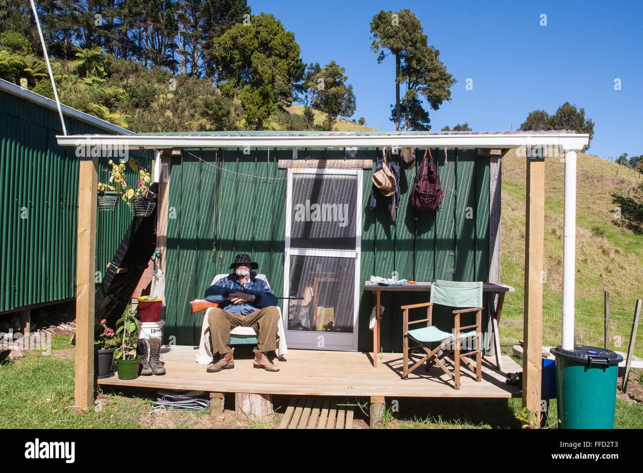 Basic accommodation in converted, conversion, shipping container on rural land in Waitakere Ranges north of Auckland,North Island,New Zealand,Pacific Stock Photo