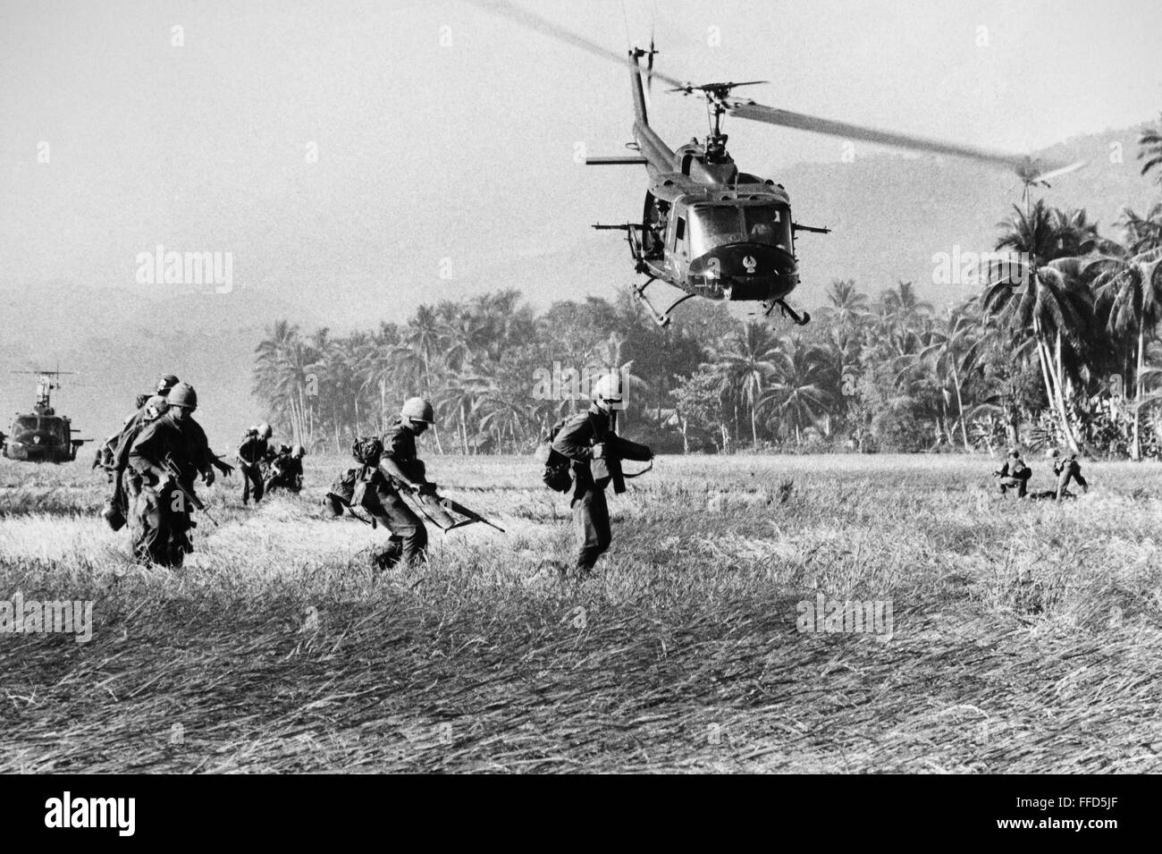 VIETNAM WAR: HELICOPTER. /nAmerican soldiers and helicopters in action in South Vietnam. Stock Photo