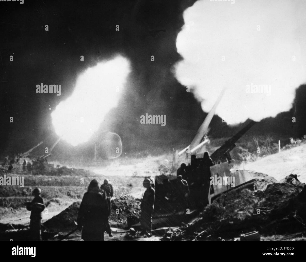 KOREAN WAR: ARTILLERY. /nAmerican infantry firing 155mm cannon near the front lines, five miles south of the Imjin River. Photographed 1951. Stock Photo