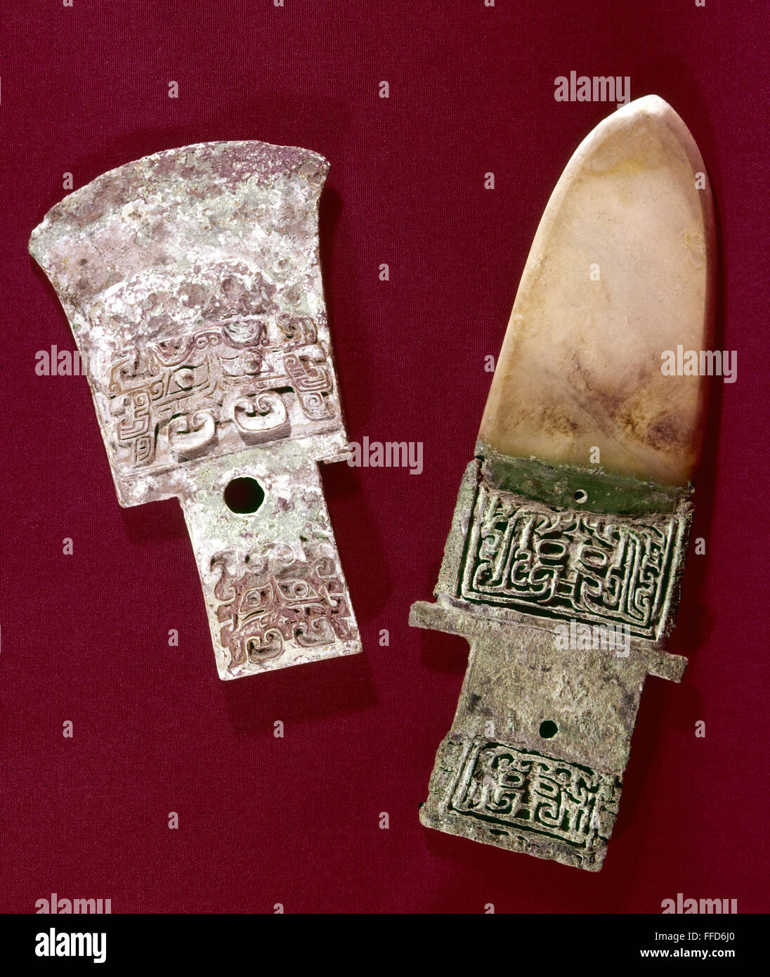 CHINA: BLADE AND DAGGER. /n'Yueh' ax blade in bronze (left) and 'ko' dagger blade in brown jade, late Shang Dynasty (c1766-c1122 B.C.), China. Stock Photo