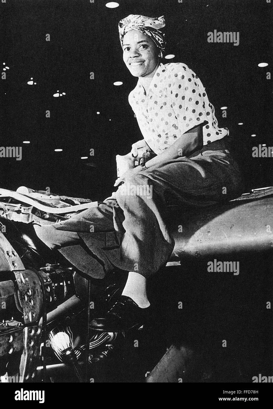 WORLD WAR II RIVETER. /nA woman riveter photographed at the Lockheed