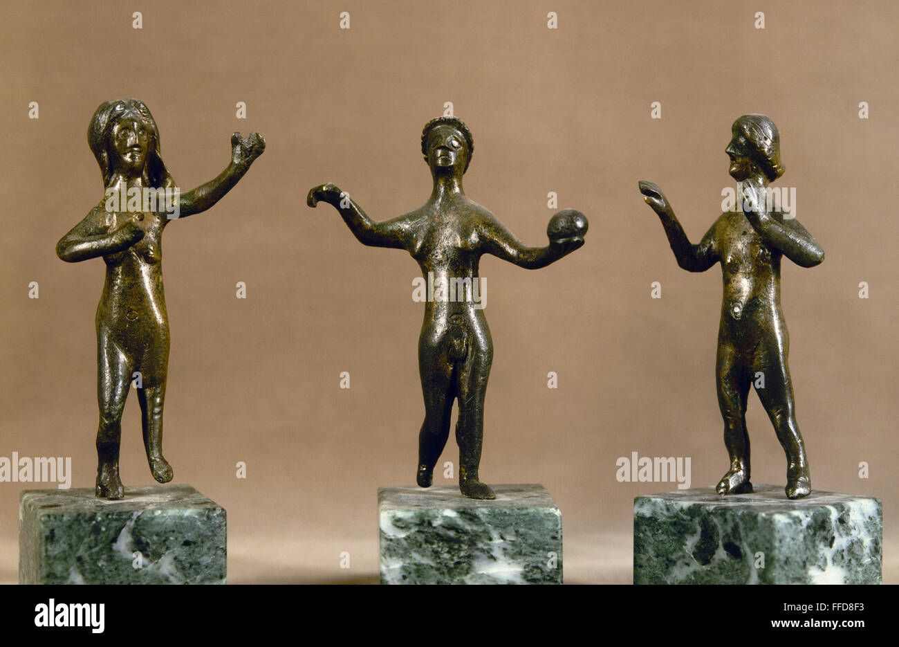 GALLO-ROMAN SCULPTURE. /nThree bronze figurines found near Orleans, France. Stock Photo