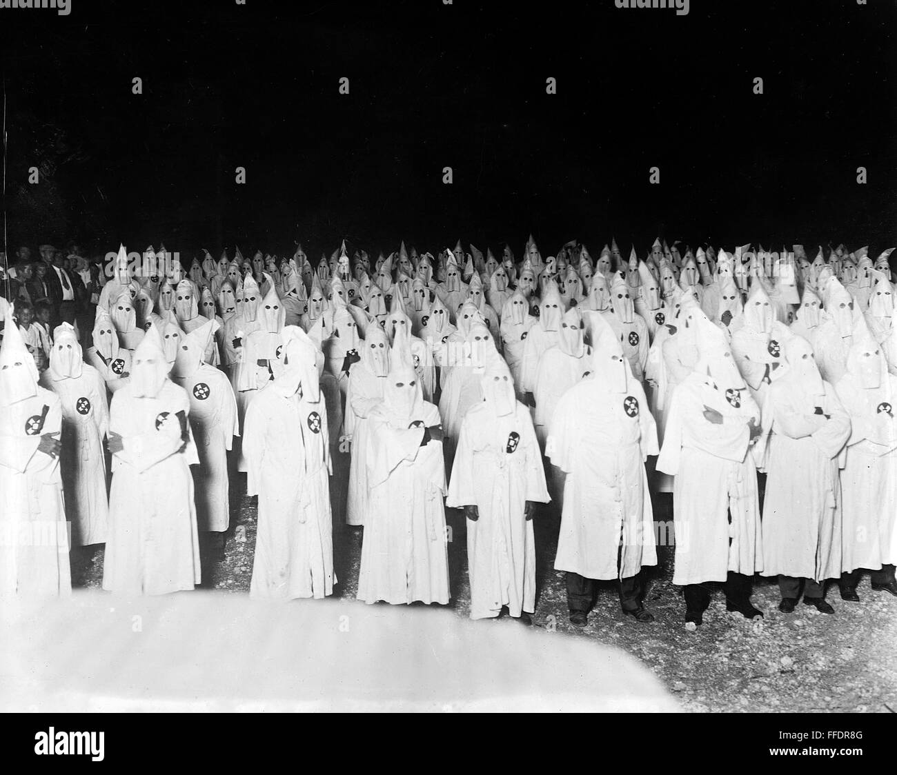 KU KLUX KLAN, c1921. /nA gathering of the Ku Klux Klan at night. Photograph, c1921-1922. Stock Photo