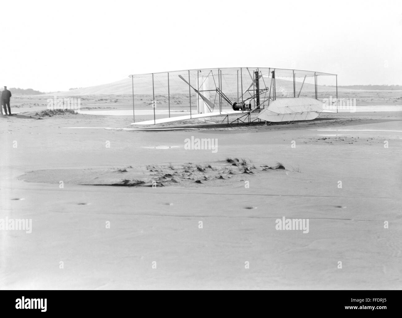 WRIGHT BROTHERS' AIRPLANE. /nDamaged Wright Brothers' machine, with a