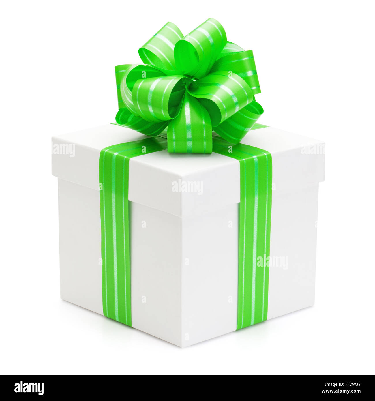 Gift box with green ribbon and bow, isolated on the white background, clipping path included. Stock Photo