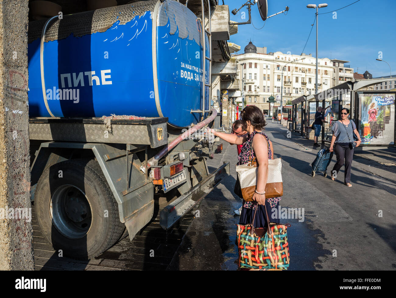 lorry with drinkable water tank in Zeleni Venac district during hot summer day in Belgrade, Serbia Stock Photo