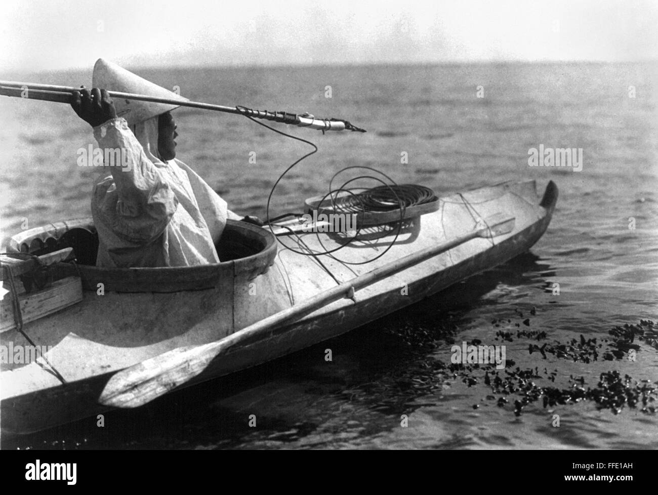 ALASKA: HARPOON, c1929. /nAn Eskimo man seated in a kayak ...