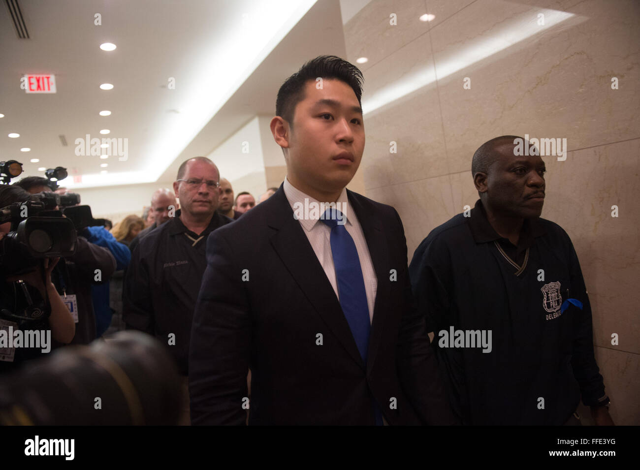 New York, NY, USA. 11th Feb, 2016. NYPD officer PETER LIANG enters the Brooklyn Supreme courtroom as the jury deliberates charges against him in the shooting death of Akai Gurley, Thursday, Feb. 11, 2016. Credit:  Bryan Smith/ZUMA Wire/Alamy Live News Stock Photo