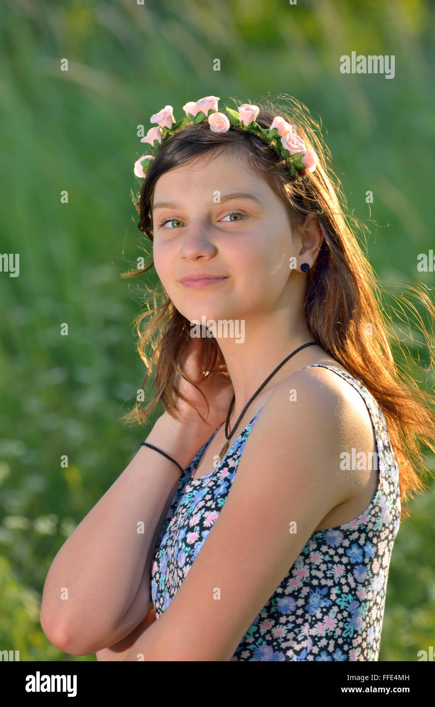 teen girl with wreath in summer time Stock Photo