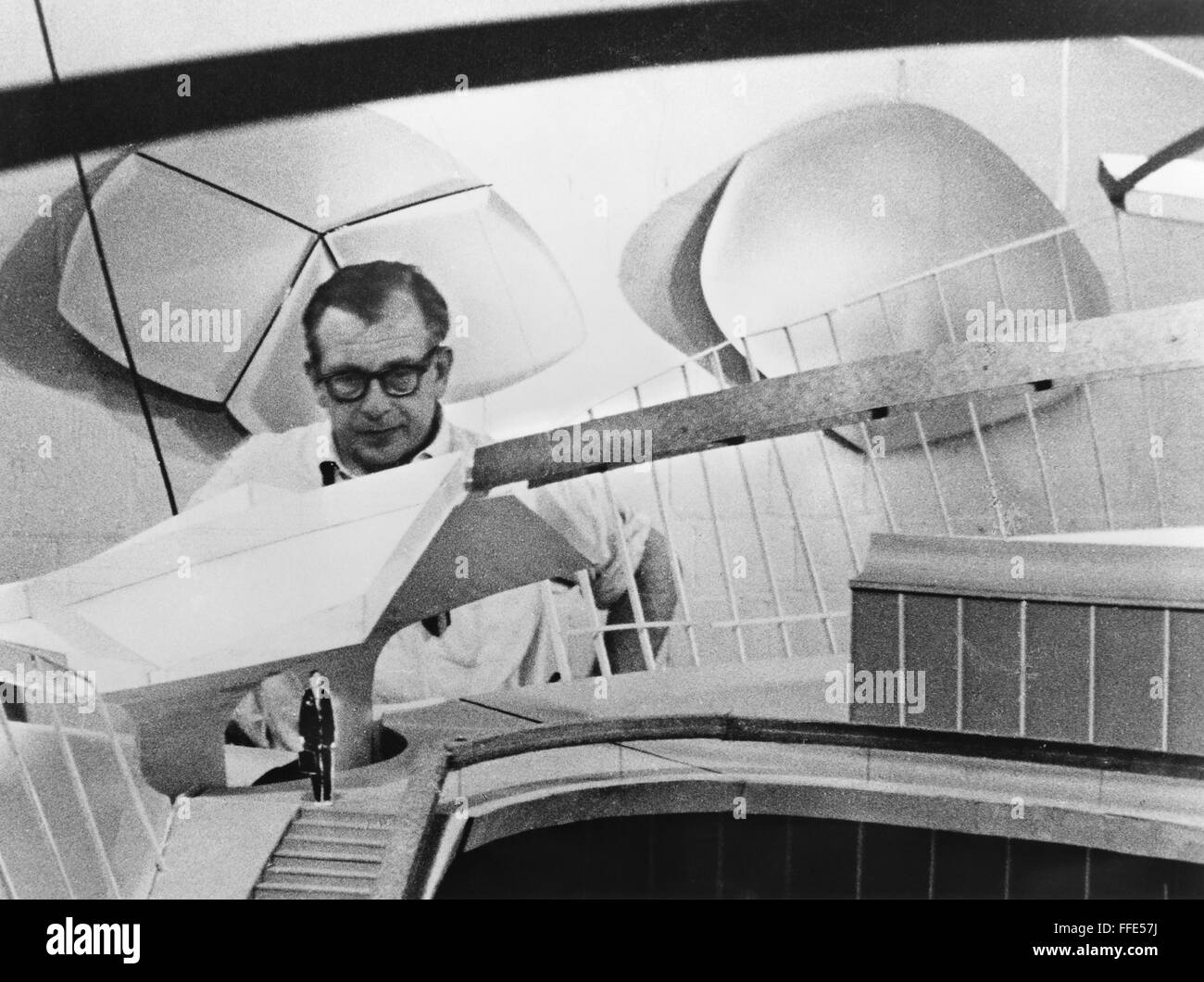 EERO SAARINEN (1910-1961). /nFinnish architect. With a scale model of the TWA Terminal at Kennedy Airport, New York. The terminal was completed in 1962, after Saarinen's death. Stock Photo